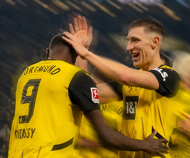 Schlotterbeck and Guirassy celebrate (photo)