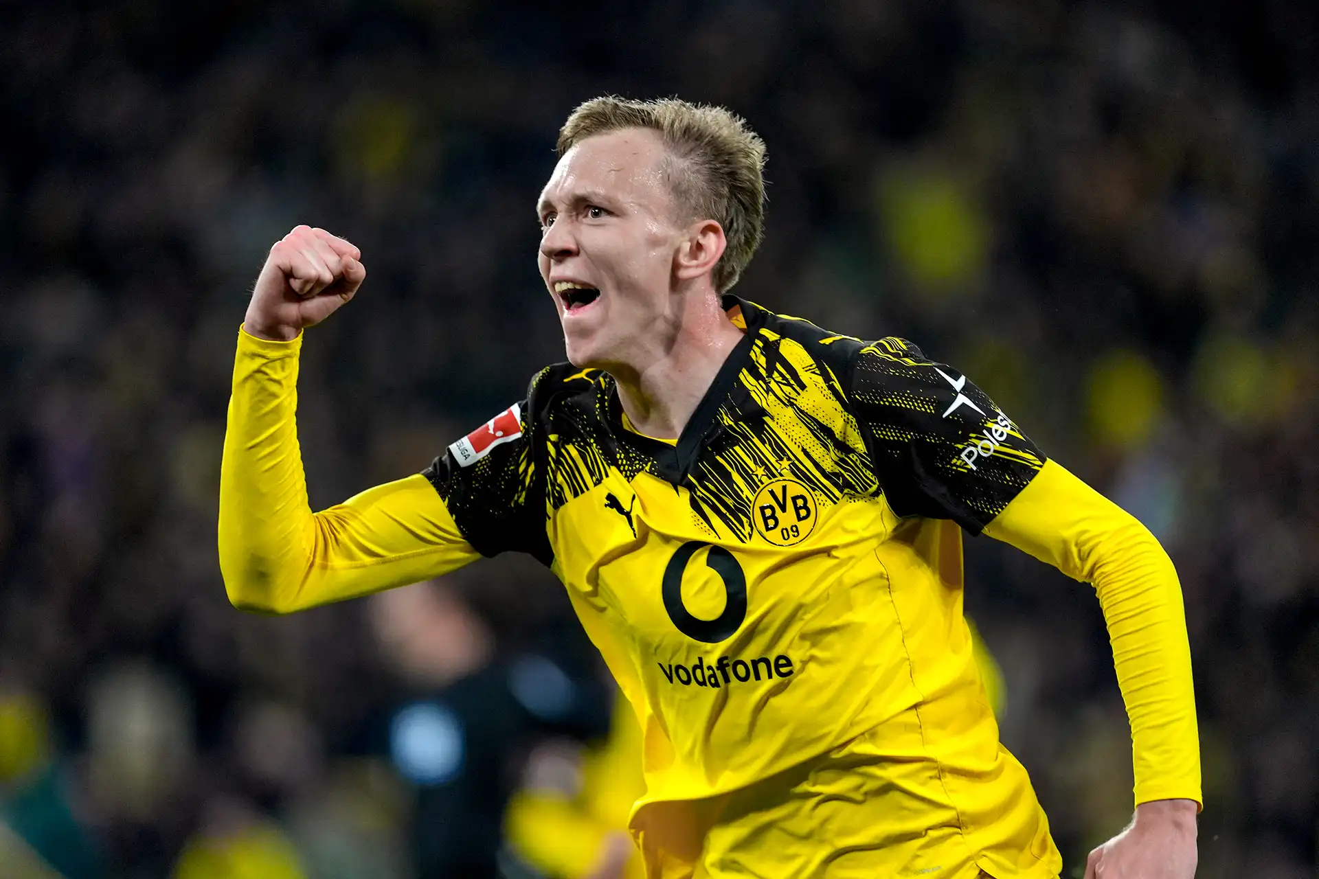 Beier celebrating his late winning goal, clenching his fist (photo)