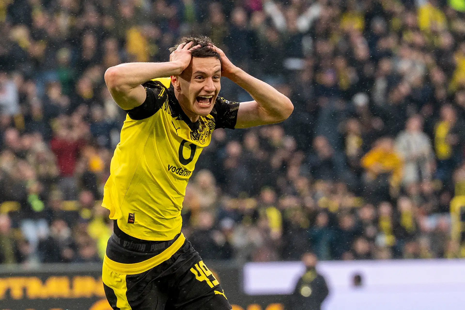 Reggiani grabbing his head in disbelief after his goal (photo)