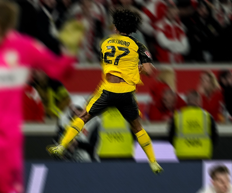 Adeyemi jumping up in celebration (photo)