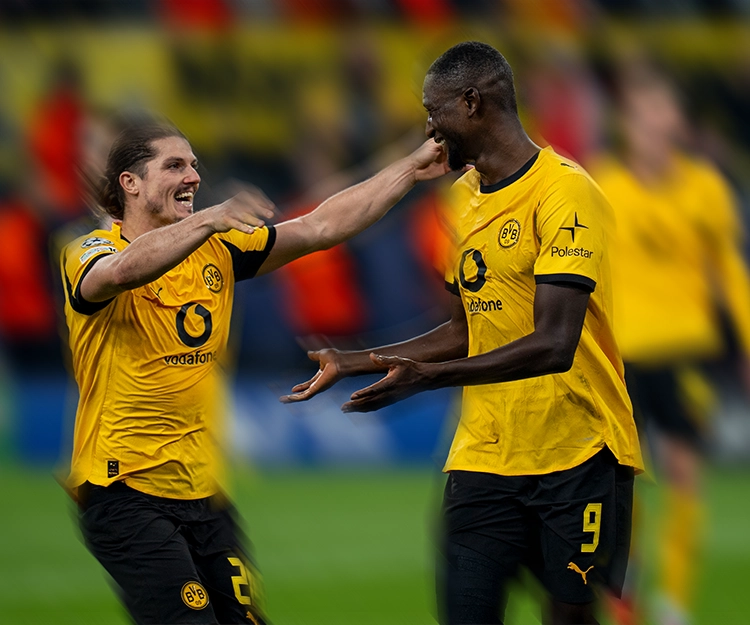 Sabitzer and Guirassy celebrating (photo)